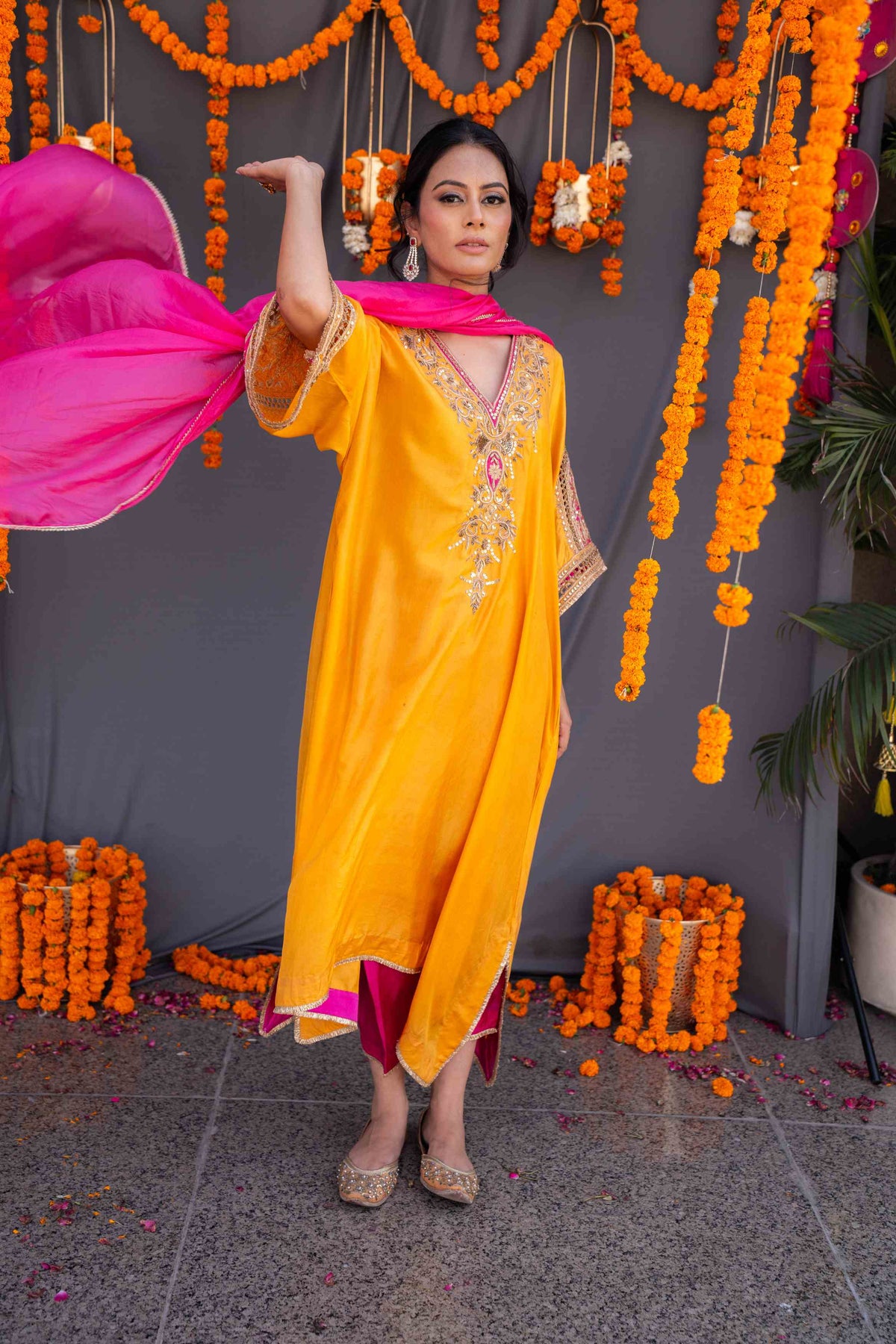 Yellow kaftaan with magenta pants and dupatta