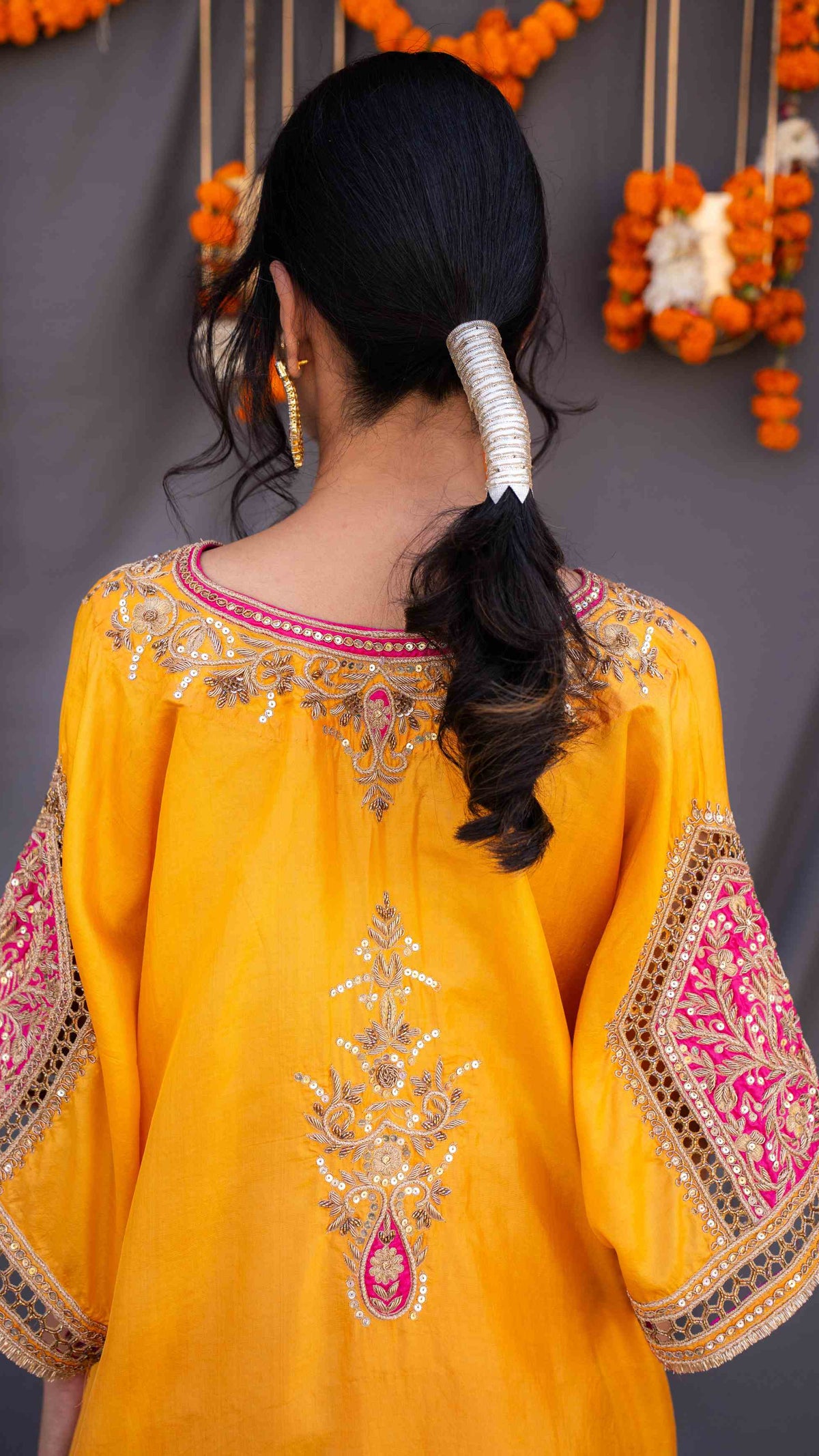 Yellow kaftaan with magenta pants and dupatta
