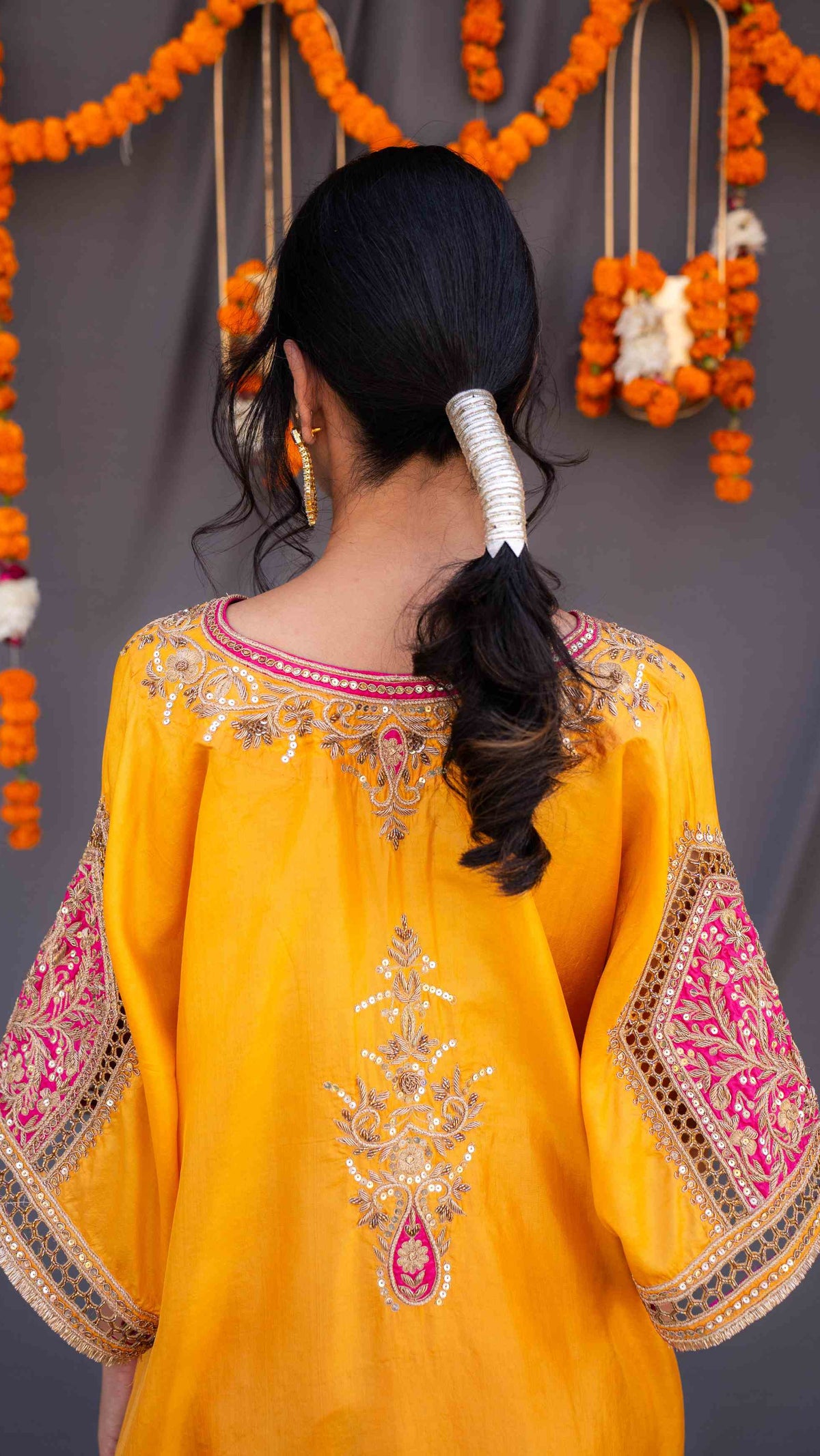 Yellow kaftaan with magenta pants and dupatta