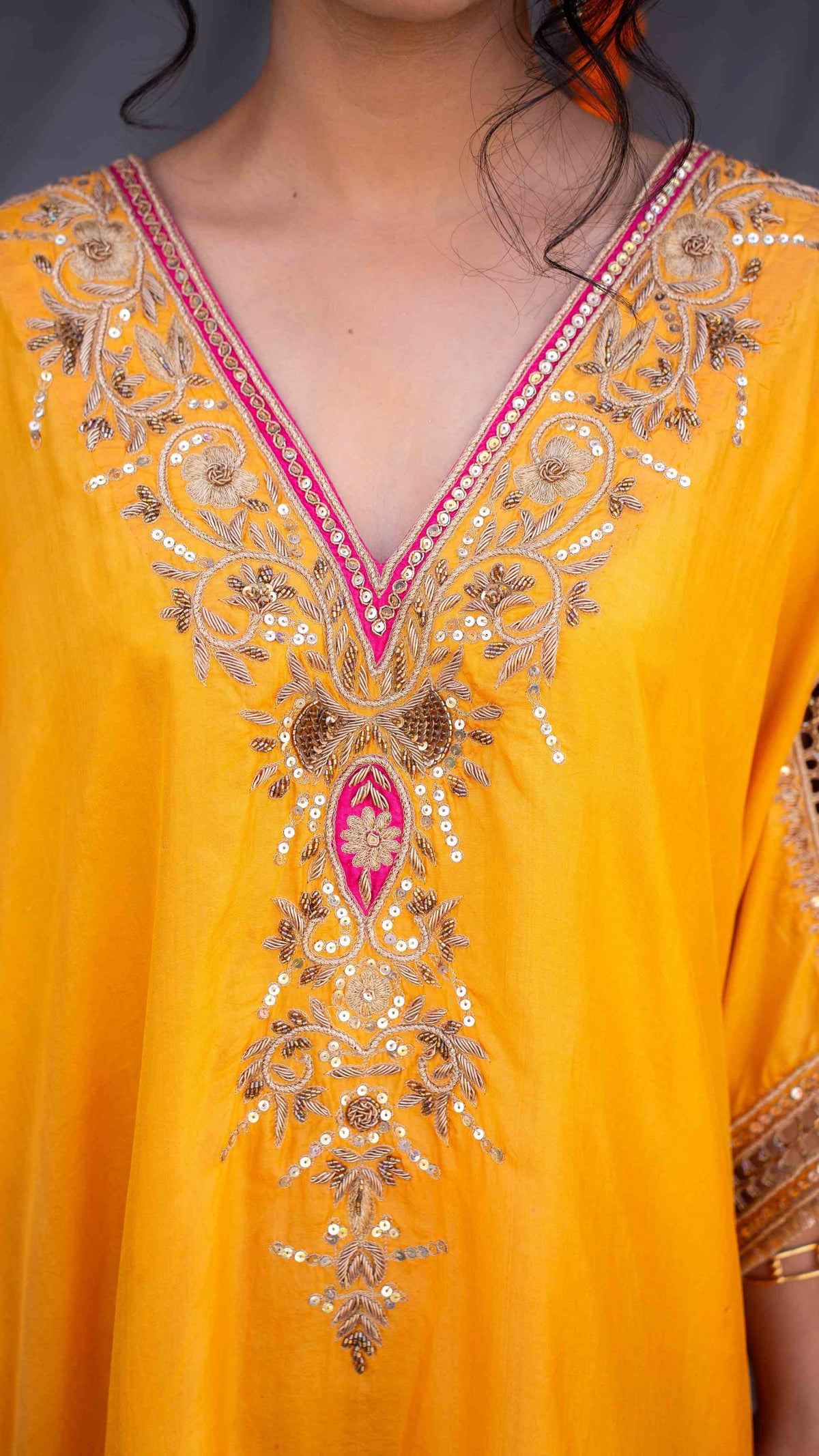 Yellow kaftaan with magenta pants and dupatta
