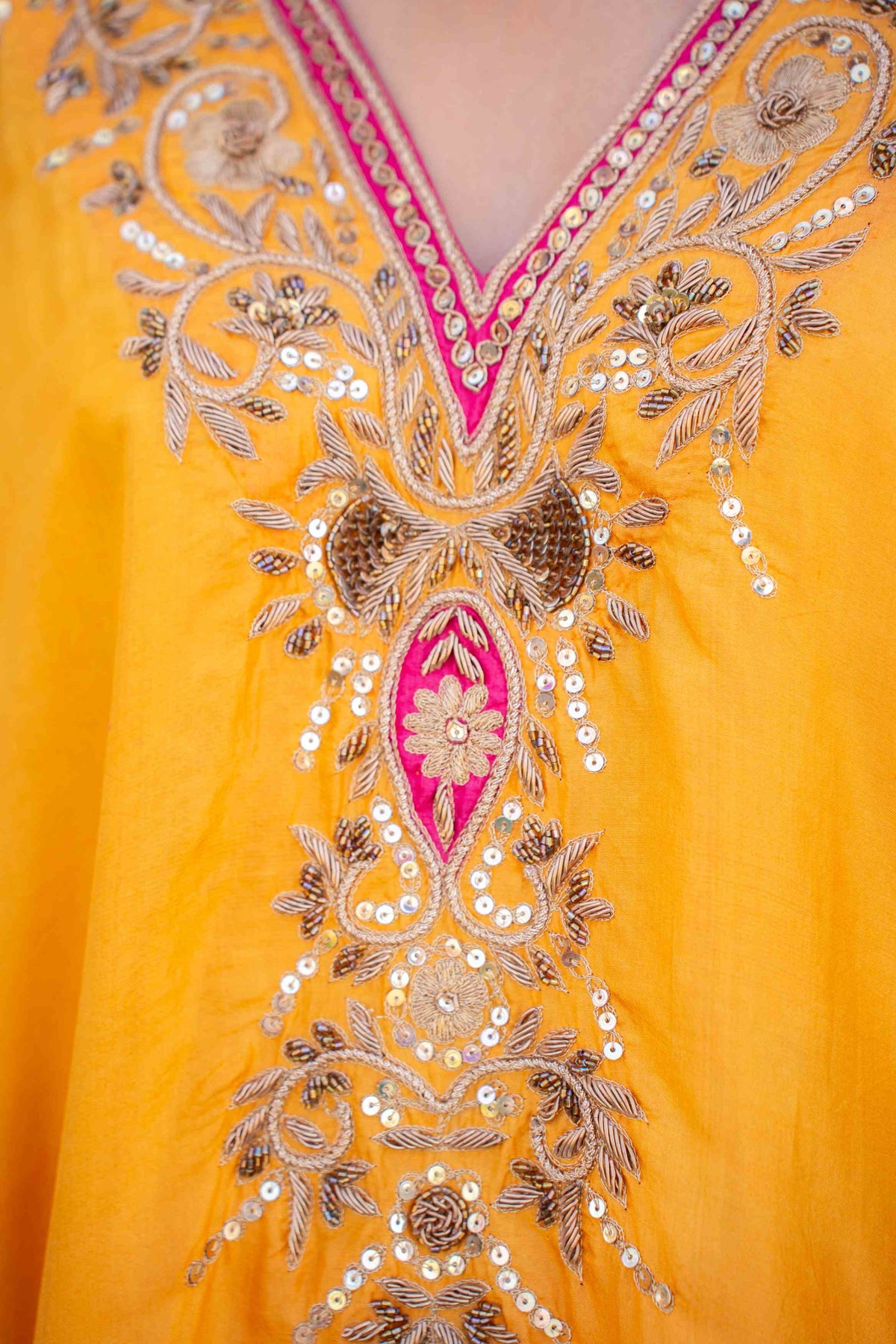 Yellow kaftaan with magenta pants and dupatta