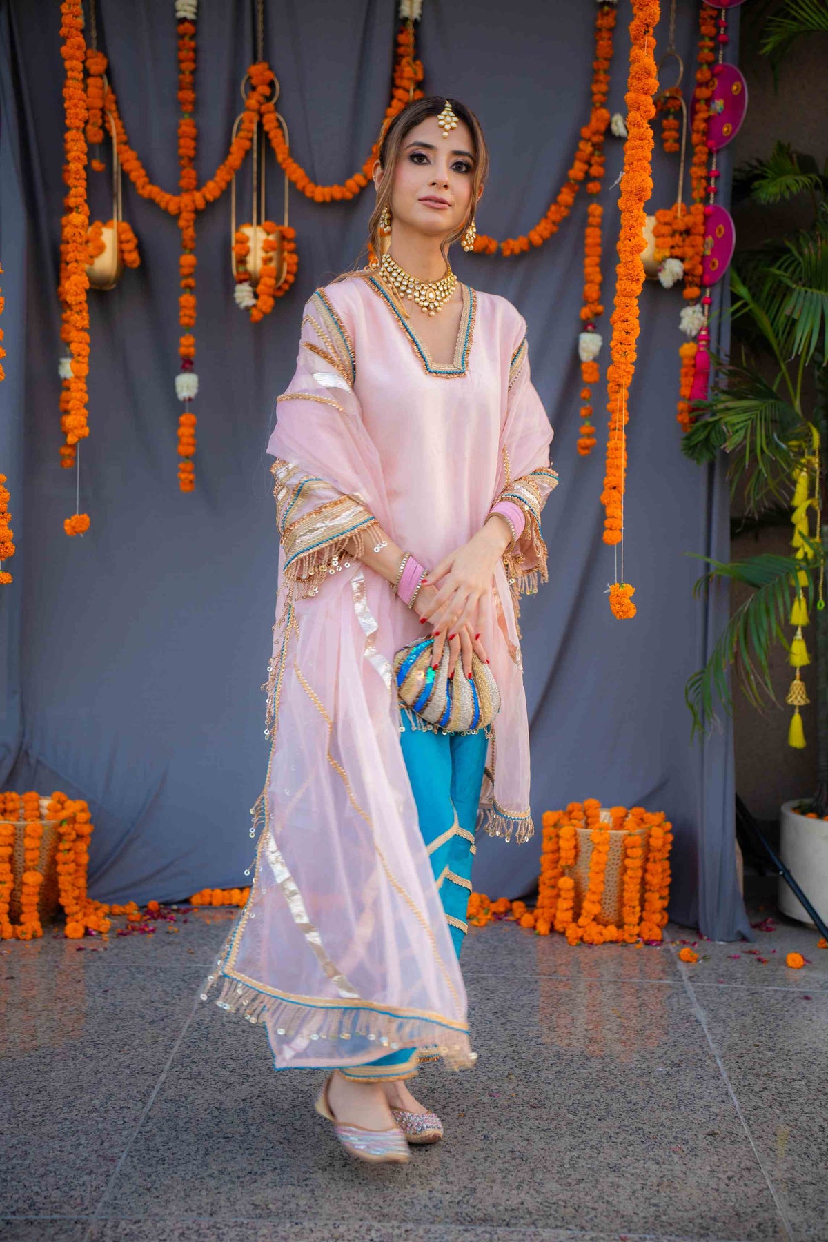 Rosegold shirt with blue pants and organza dupatta