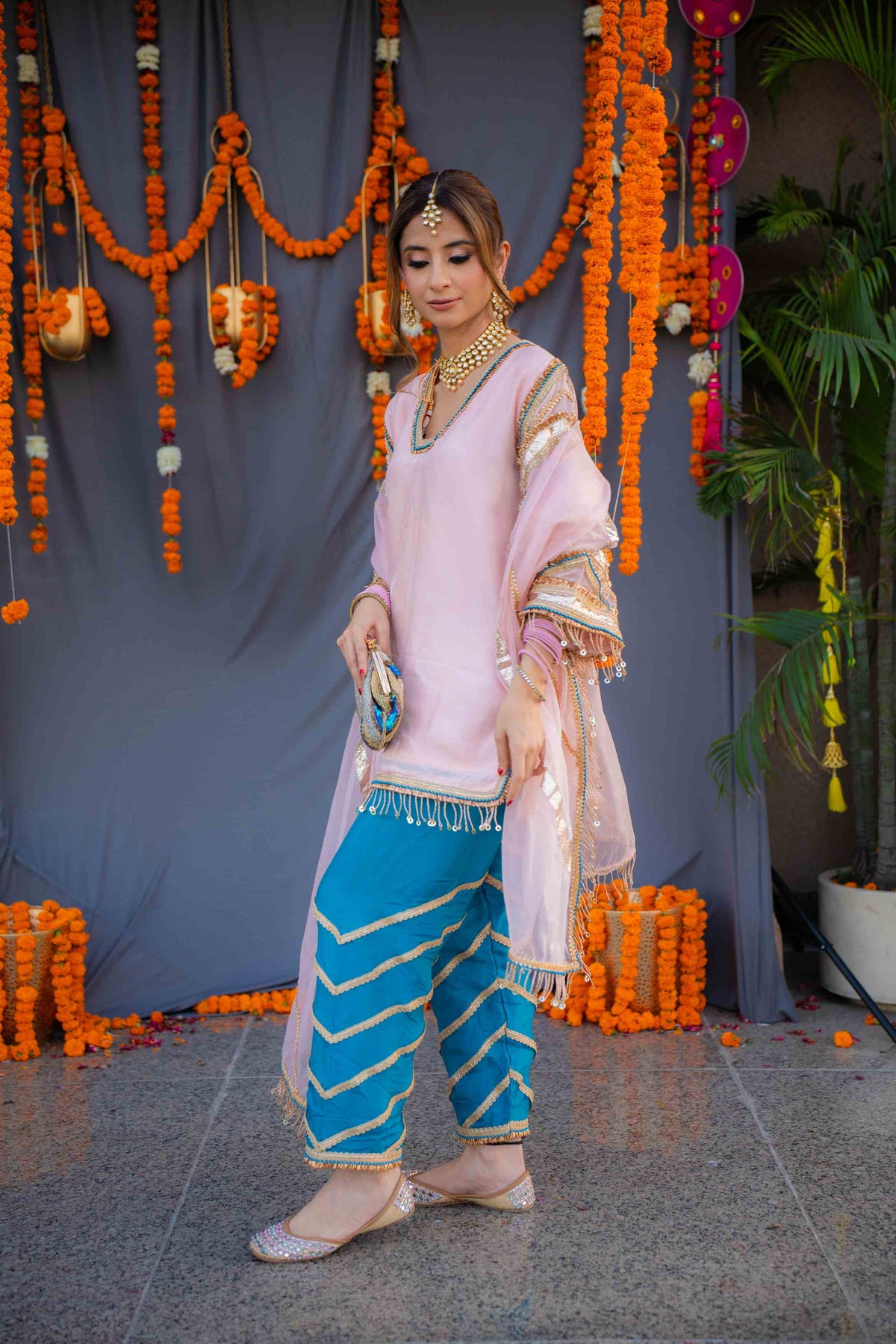 Rosegold shirt with blue pants and organza dupatta