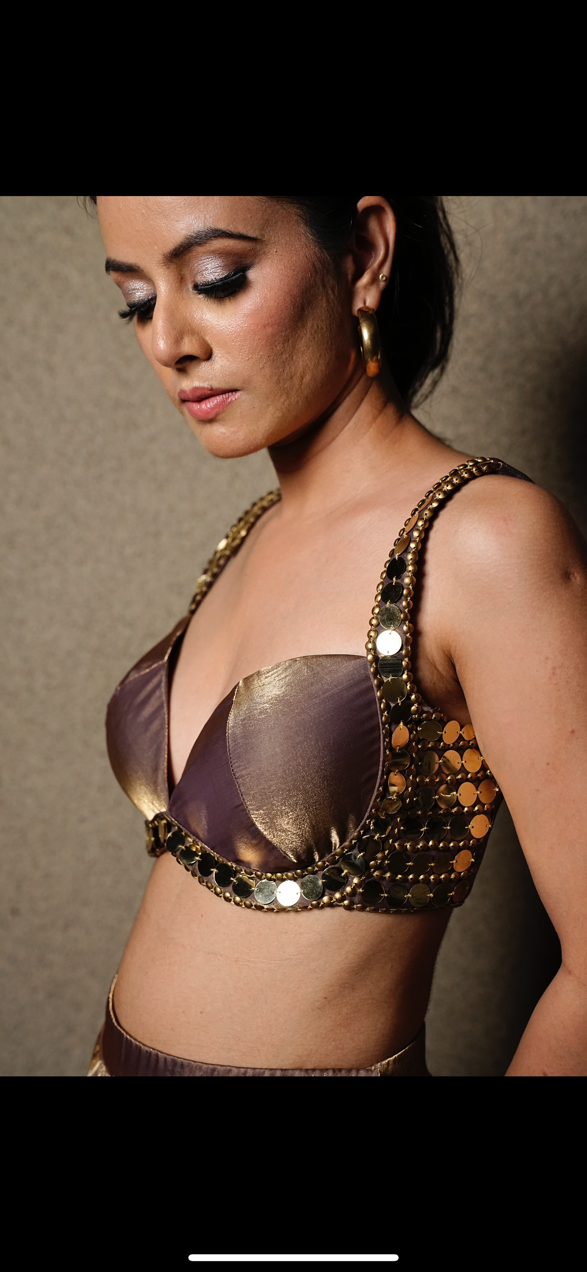 Bustier with metallic pallazos